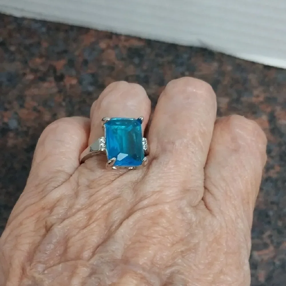 Unlisted Silver Ring with Vibrant Blue Gem..it Is In perfect Condition b